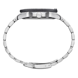 Close-up of a silver watch band on a white background